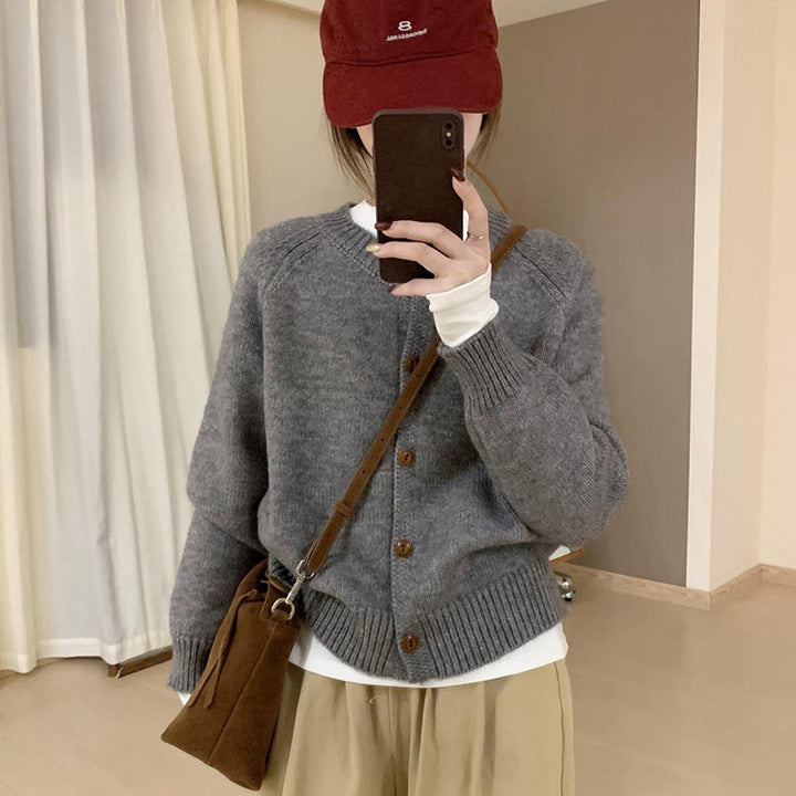 Comfortable knit sweater for women with button details and dropped shoulders Lune London