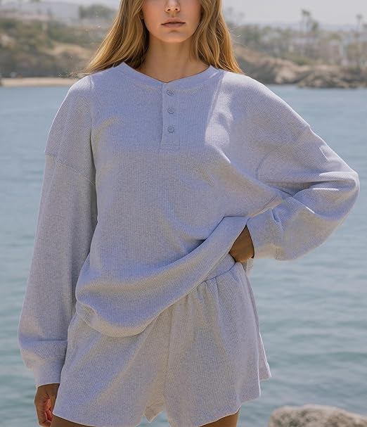 Dames loisirs t-shirt à manches longues pull avec détails de boutons Chic & Stil