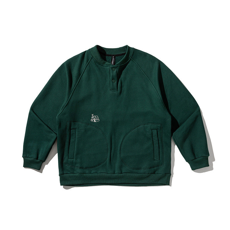 Unisex Oversize Henley Sweatshirt with raglan sleeves, button placket, and distinctive round pockets Amarae