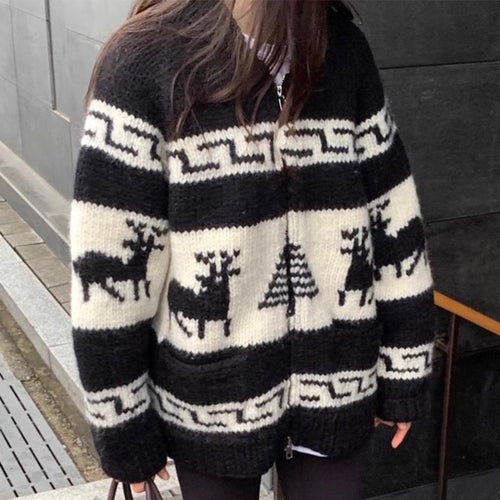 Women's cardigan with festive reindeer pattern and practical pockets Amarae