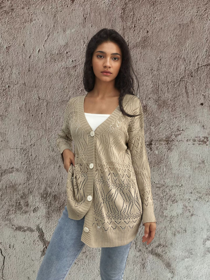 Women's knit jacket with a lovely hole pattern and elegant button details Lune London