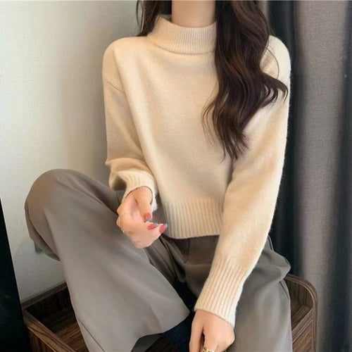 Ladies thick knit pullover with high collar and ribbed pattern Amarae