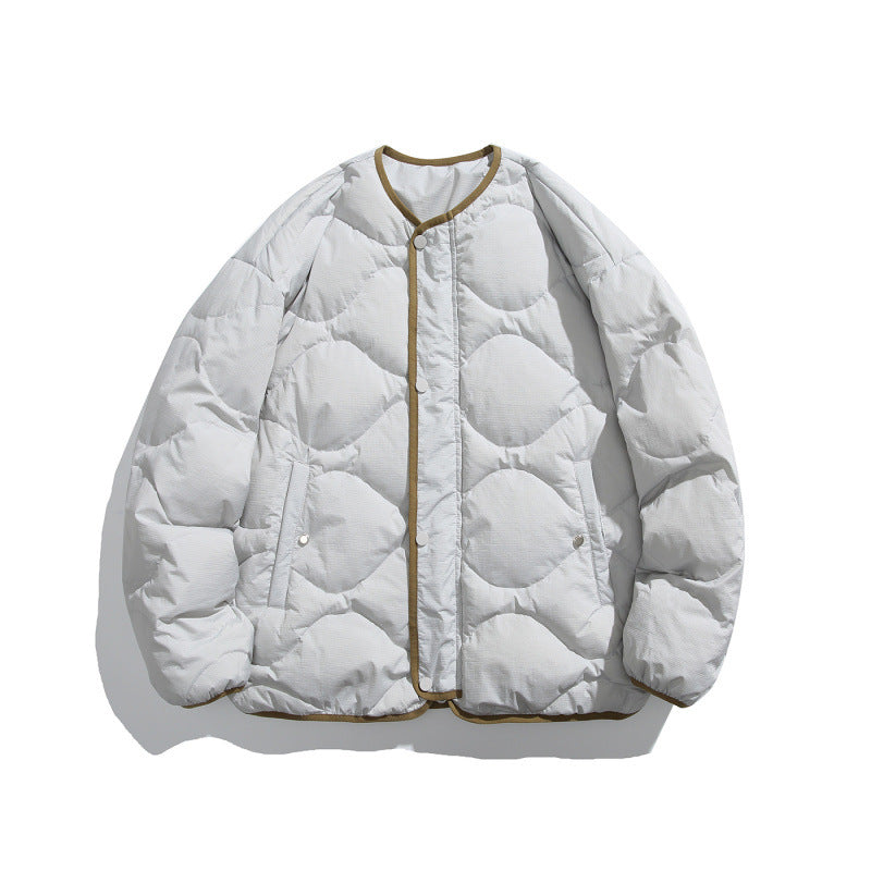 Unisex Kastig padded short jacket with circular quilting, round neckline and contrast piping Amarae