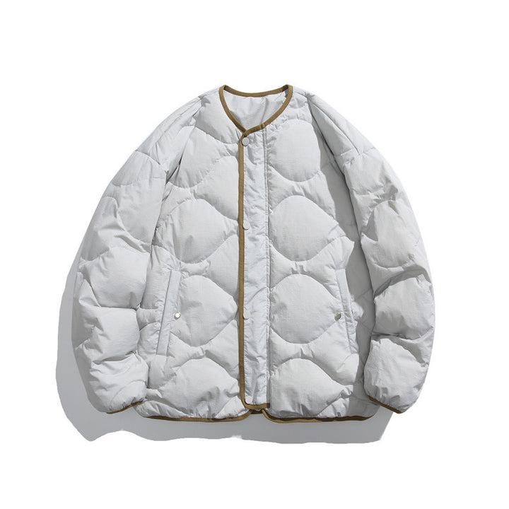 Unisex Kastig padded short jacket with circular quilting, round neckline and contrast piping Amarae