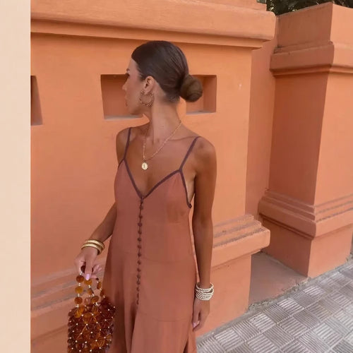 Maxi dress for women with fine button details and a delicate V neck Amarae