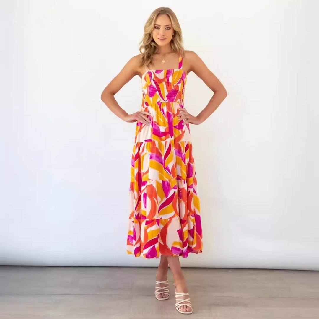 Maxi dress inspired by boho for women with colorful floral pattern and elastic top Chic & Stil