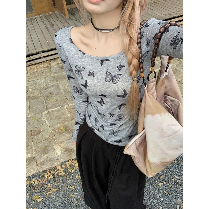 Women's long sleeve top with delicate butterfly pattern Chic & Stil