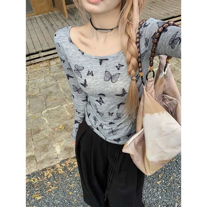 Women's long sleeve top with delicate butterfly pattern Chic & Stil