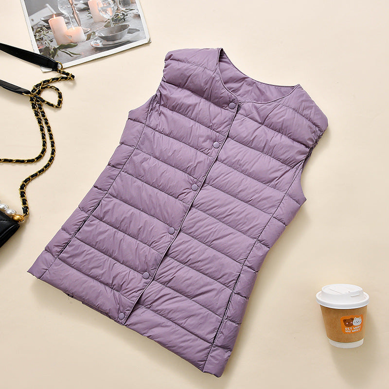 Women's sleeveless quilted thermal vest with round neck and snap button placket Amarae