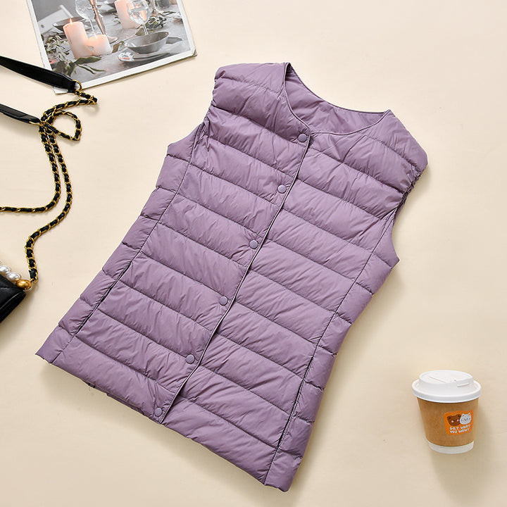 Women's sleeveless quilted thermal vest with round neck and snap button placket Amarae