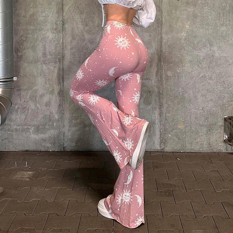 Flared yoga pants for women with a fun moon and sun pattern Lune London