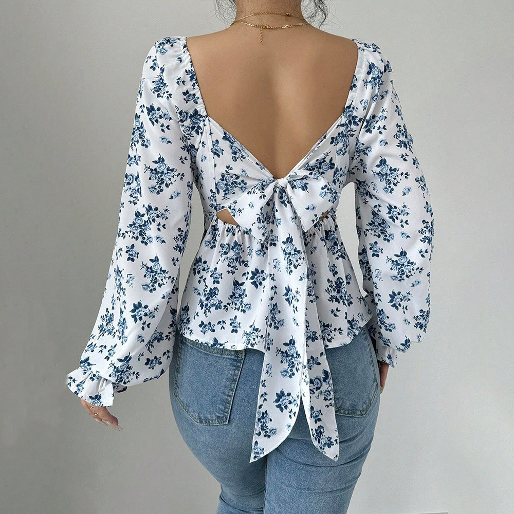 Blouse femme avec design floral et manches volumineuses Chic & Stil