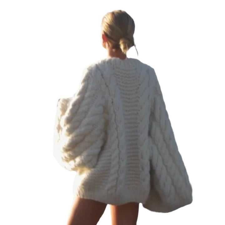 Oversized knitted sweater for women with textured cable design Lune London
