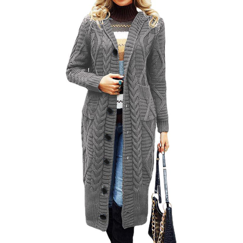 Ladies elegant knit coat with a deep V-neck and an elaborate cable pattern Lune London