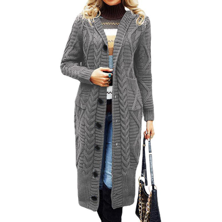 Ladies elegant knit coat with a deep V-neck and an elaborate cable pattern Lune London
