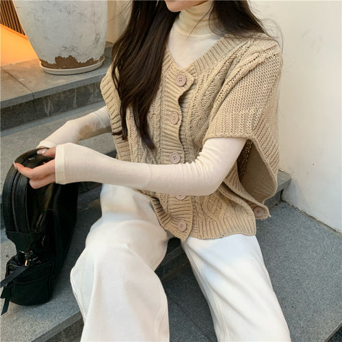 Pull en tricot pour femmes avec patte de boutonnage et motif en relief Chic & Stil