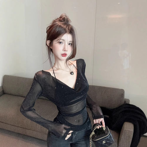 Women's sparkling long-sleeve top with deep V-neck and transparent details Amarae