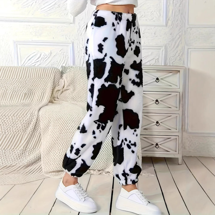 Women's plush pants with a trendy cow spot pattern and an elastic waist Lune London