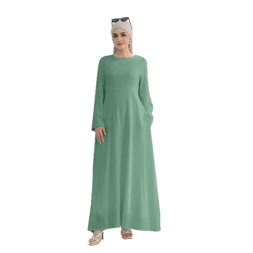 Elegant maxi dress for women with long sleeves and side pockets Lune London