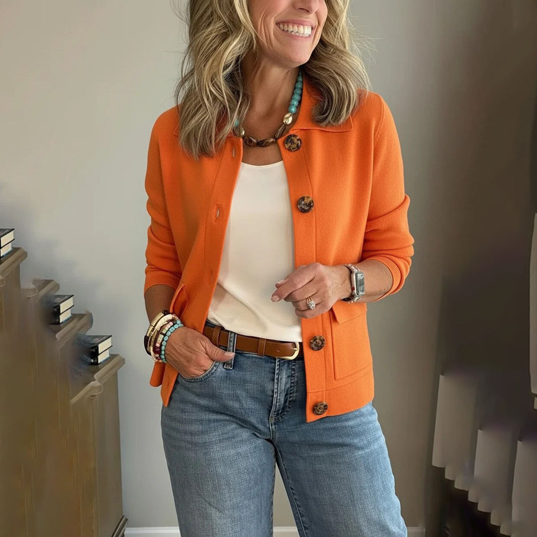 Women's short knitted cardigan with shirt collar, patch pockets, and horn buttons Amarae