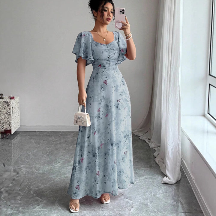 Women's maxi dress with flowing cut and romantic floral pattern Lune London