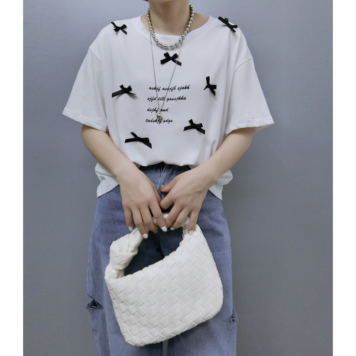 Ladies stylish graphic T-shirt with chic knot accents