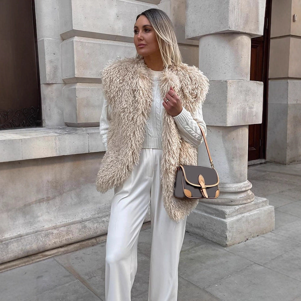 Women's Longer Cozy Faux Fur Vest with Shaggy Look and Front Pockets Amarae