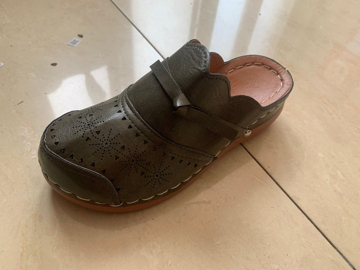 Women's Comfortable Clogs with Filigree Cutout Design and Elegant Strap Lune London