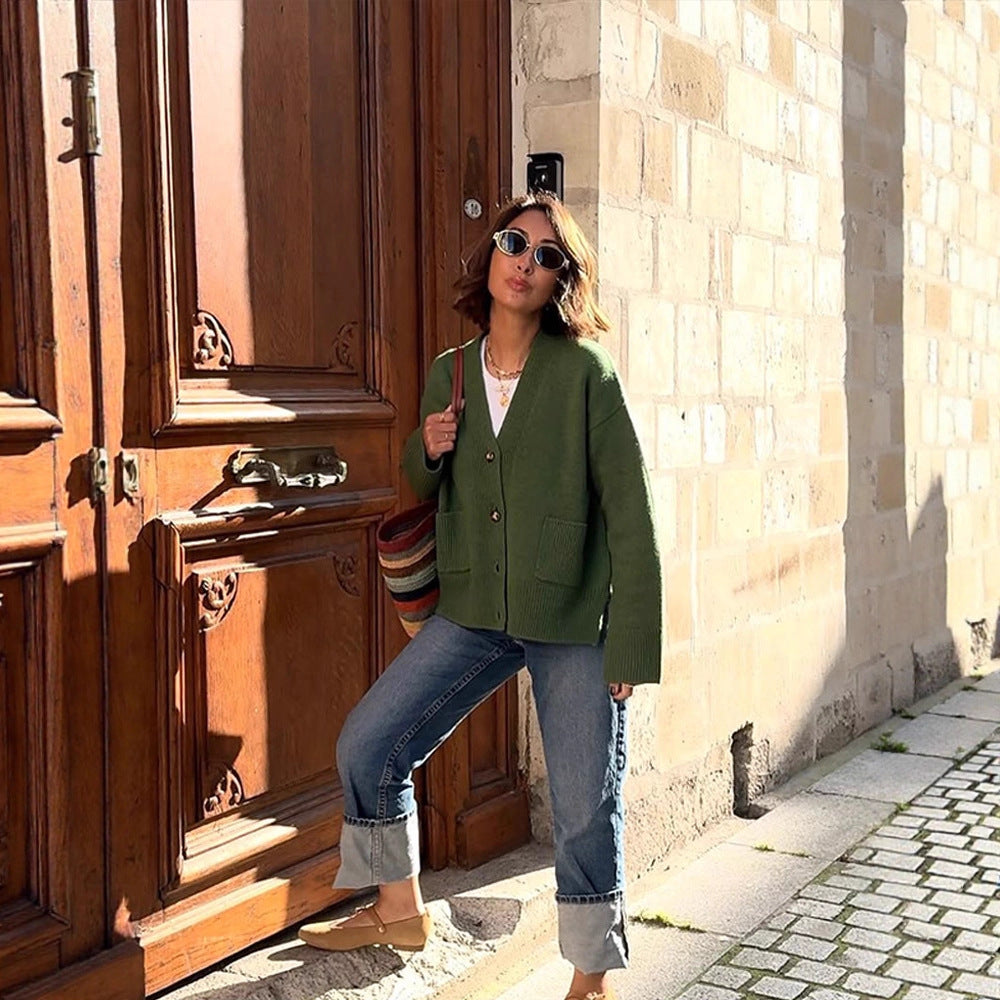 Women's oversized knit cardigan with decorative button placket, patch pockets, and elongated cuffs Amarae