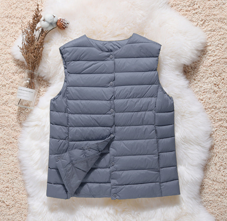 Women's sleeveless quilted thermal vest with round neck and snap button placket Amarae