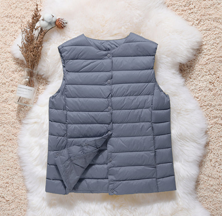 Women's sleeveless quilted thermal vest with round neck and snap button placket Amarae