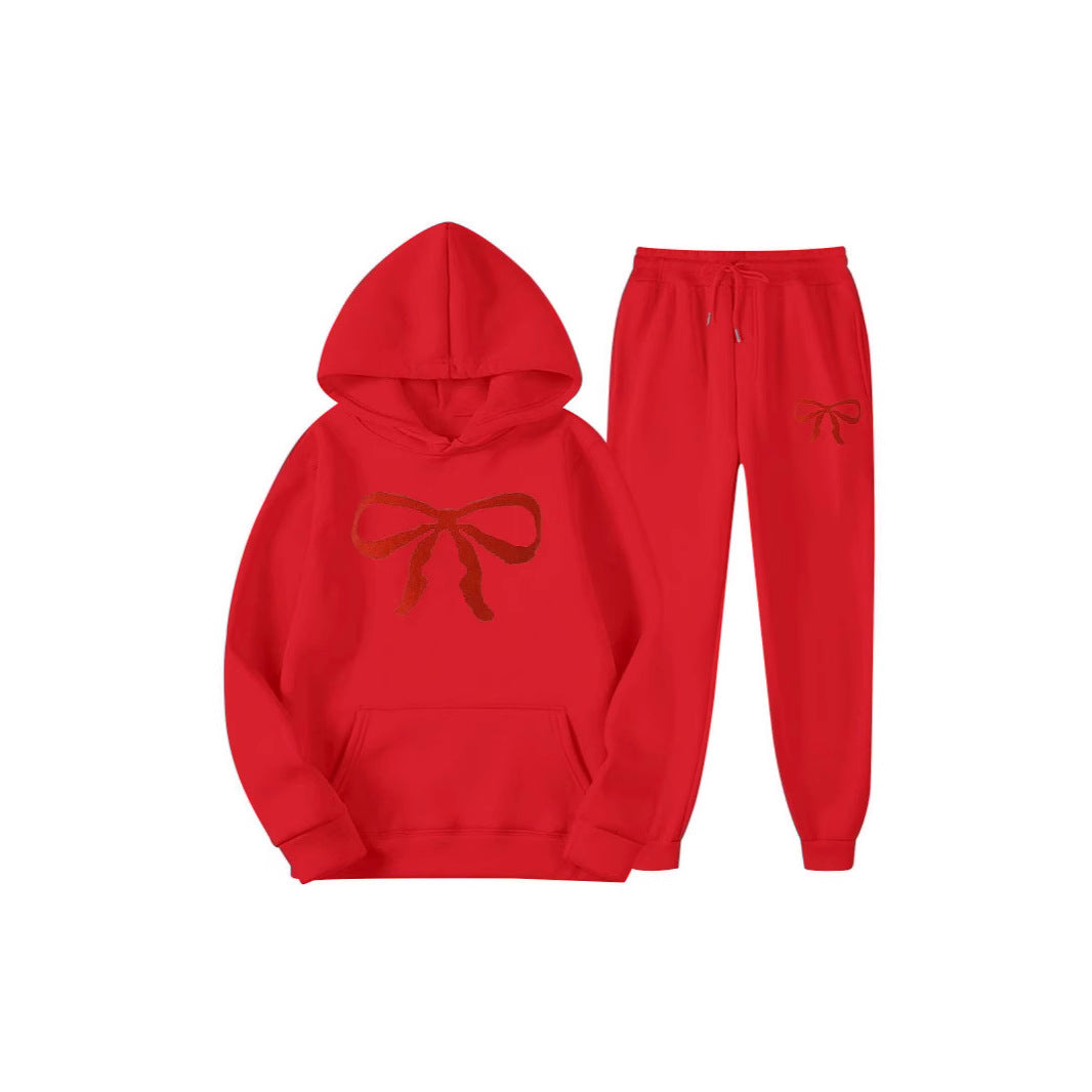 Women's hooded sweat suit with creative bow motif and comfortable fit Chic & Stil
