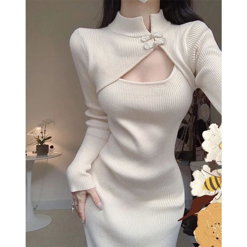 Women's elegant midi dress with asymmetrical cut-out design and textured knit