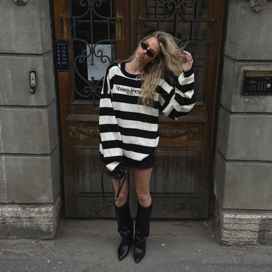 Oversized knitted sweater for women with modern stripe patterns and a Lune London logo application