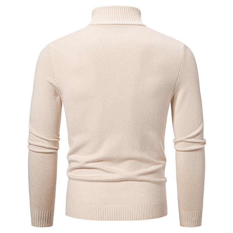 Elegant turtleneck sweater for men with a structural pattern.