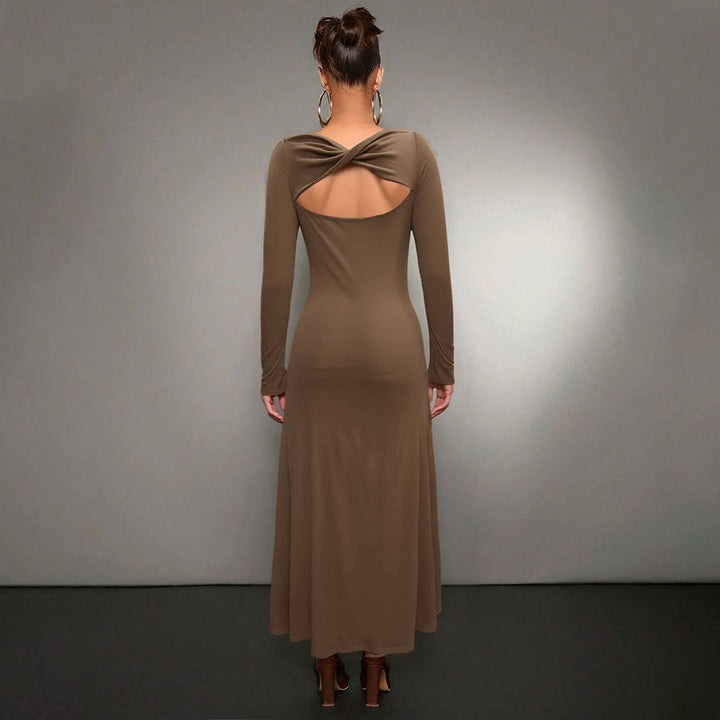 Robe midi à manches longues pour femmes avec un élégant col rond et un ourlet flottant Chic & Stil