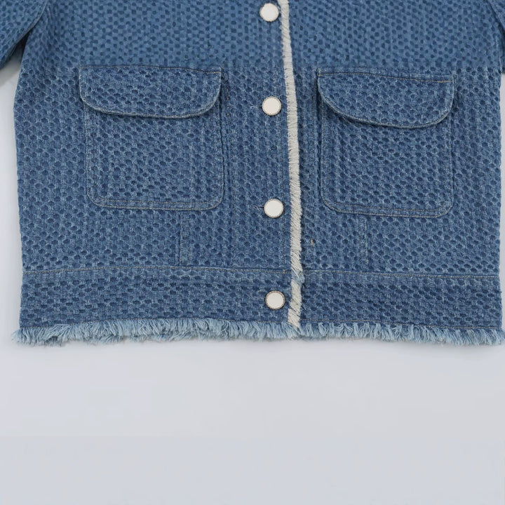 Women's short jacket made of textured denim with fringe trim and flap pockets Amarae