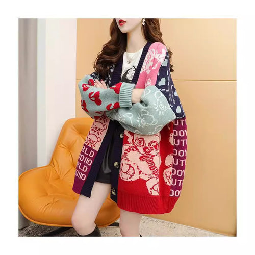 Knitted jacket for women with a vibrant pattern and practical button details Amarae