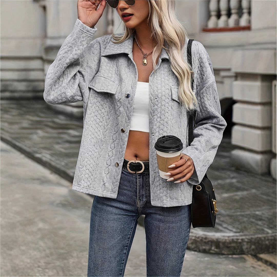 Ladies' knitted jacket with textured cable design and practical pockets Lune London