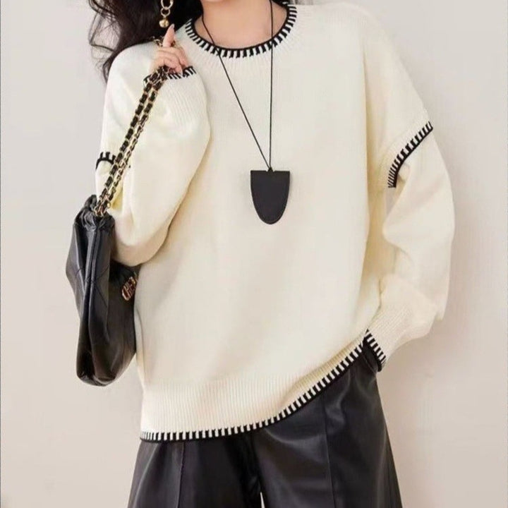 Pull confortable pour femme avec ourlet texturé et accents modernes Chic & Stil
