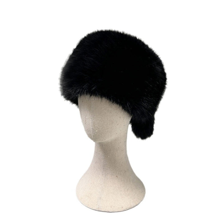 Women’s plush faux fur trapper hat with earflaps and decorative tail Amarae