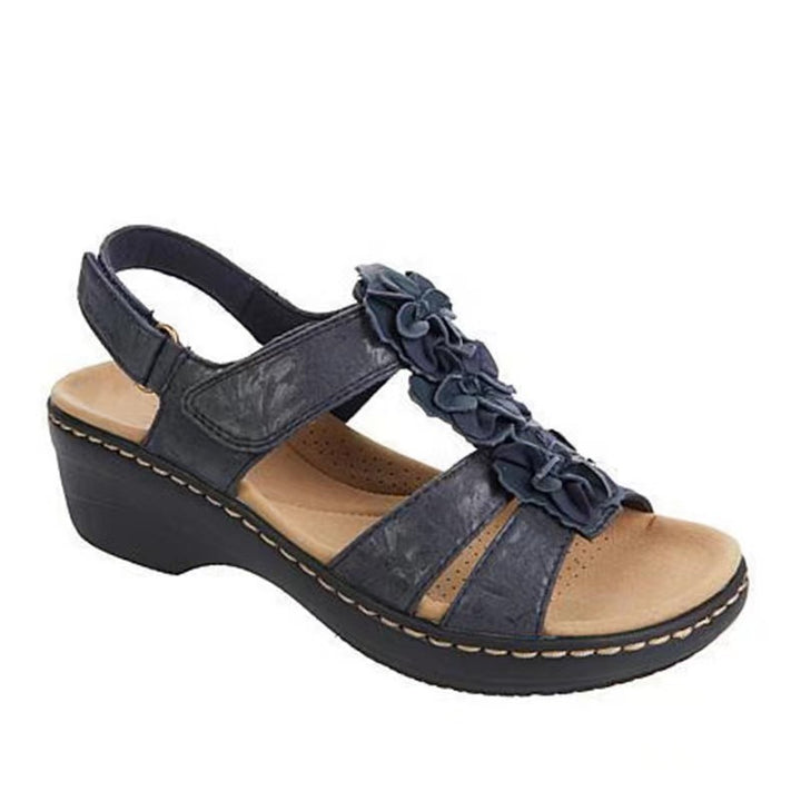 Comfortable wedge heeled sandals for ladies with delicate ruffle details Lune London