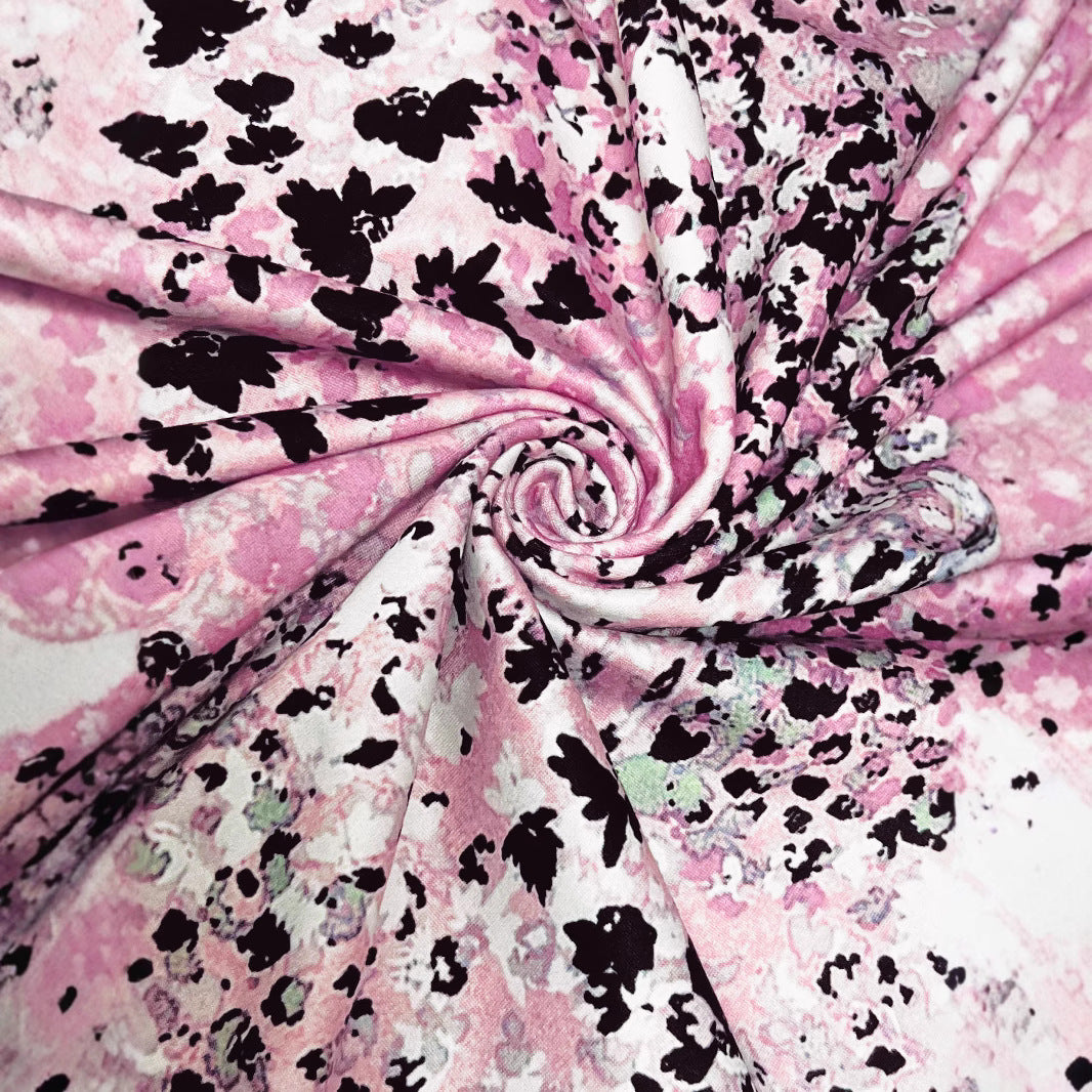 Fluid midi dress for women with eye-catching abstract patterns Lune London