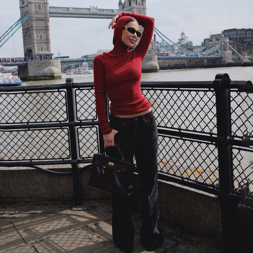 Women's fitted long sleeve top with high collar and thumb openings Amarae