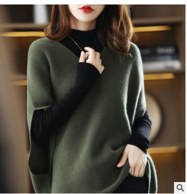 Knitted poncho for women with V-neck and chic elegant silhouette