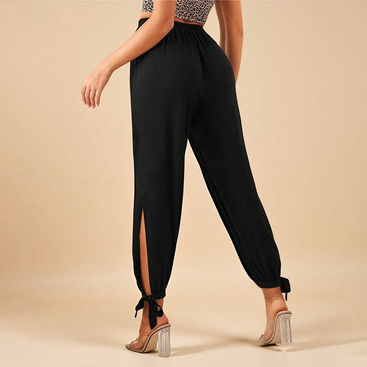 Chic & Stil Elegant women's trousers with side slits and drawstring
