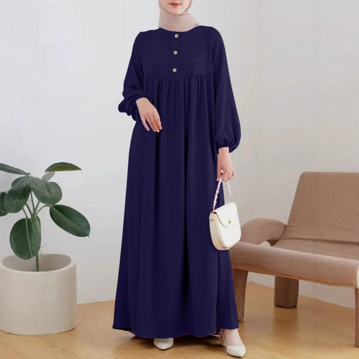 Lightweight maxi dress for women with comfortable buttoning and elegant puff sleeves Lune London