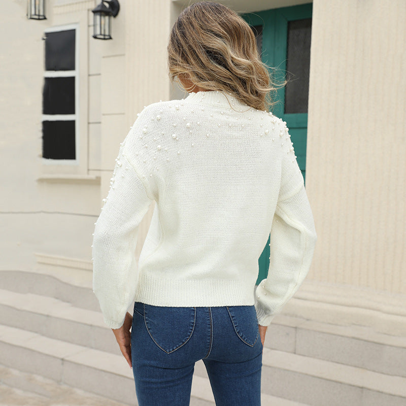 Women's sweater with decorative pearl details and a slight structure Lune London