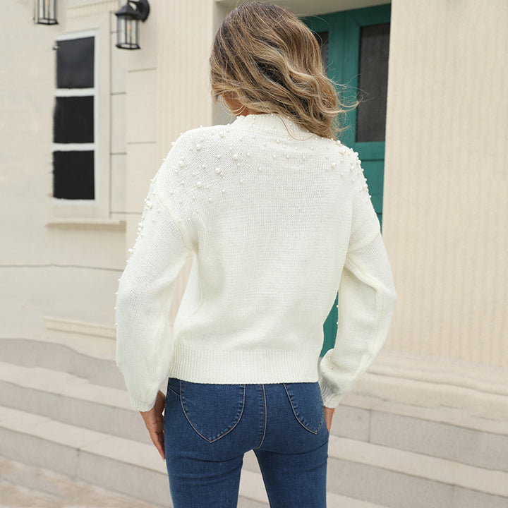 Women's sweater with decorative pearl details and a slight structure Lune London