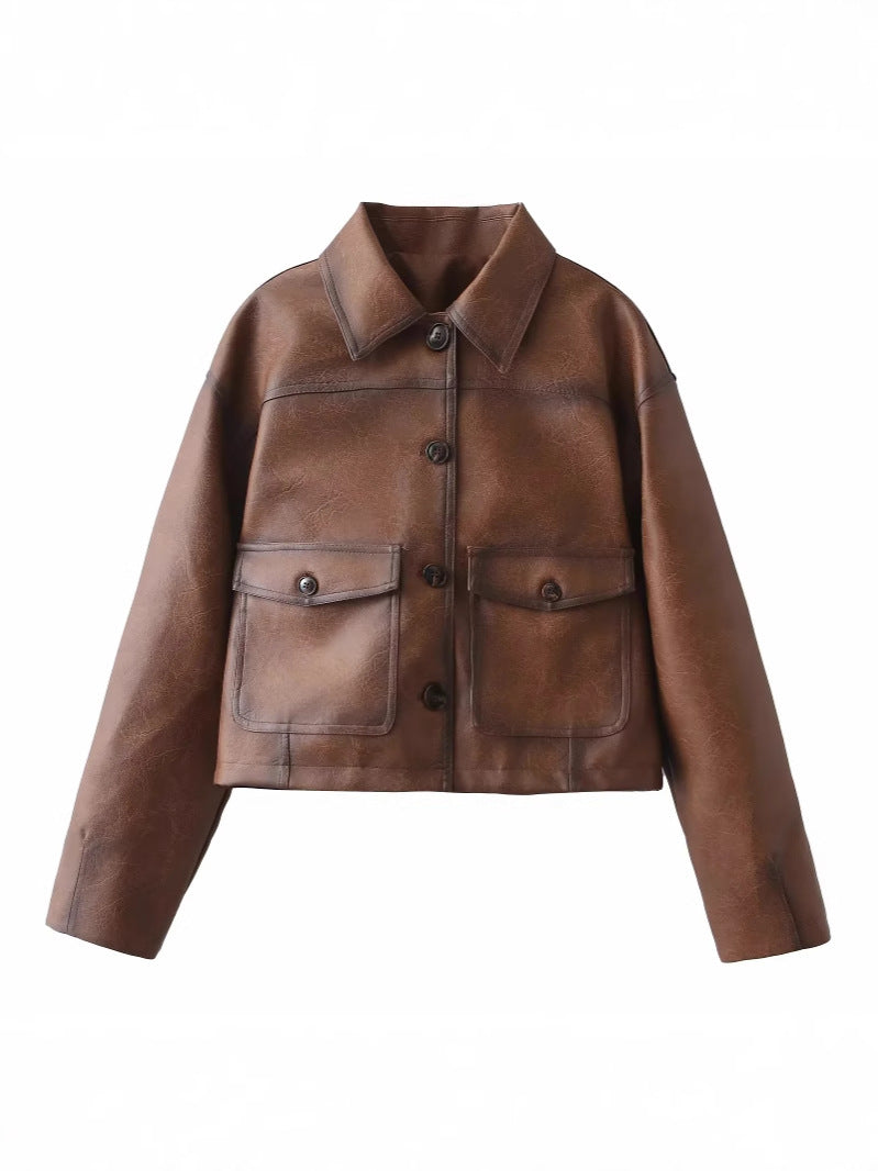 Ladies cropped leather jacket with practical chest pockets and Lune London button details
